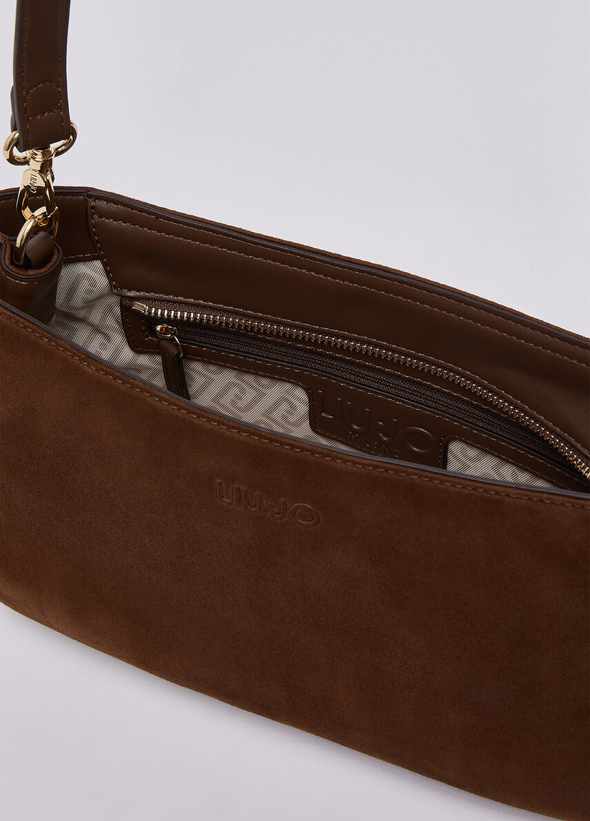 Bolsa de ombro com tachas