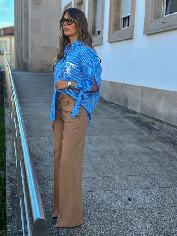 Calça malha com botão